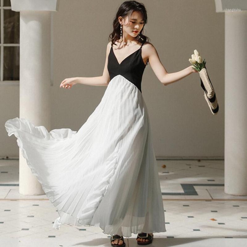 Casual Dresses French Black And White Patchwork Sexy V-Neck Suspender Backless Dress Women Summer High Waist Slim Super Fairy Long Q611
Casual Dresses French Black And White Patchwork Sexy V-Neck Suspender Backless Dress Women Summer High Waist Slim Super Fairy Long Q611