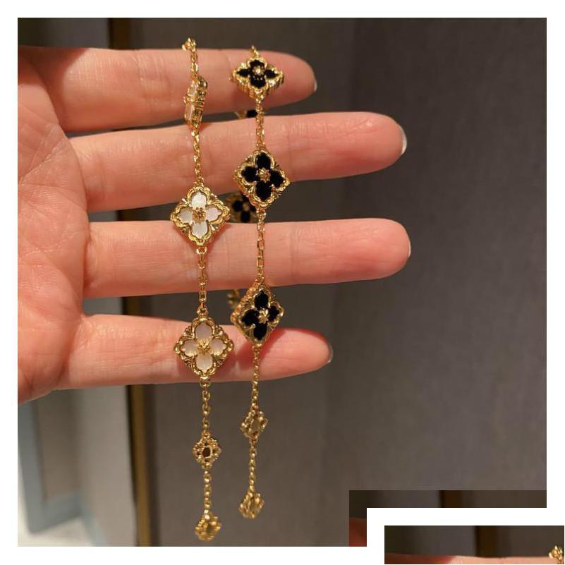 Charm Bracelets 18K Gold Luxury Clover Designer For Women Party Jewelry Drop Delivery Dhe2Q Dh2Ml
Charm Bracelets 18K Gold Luxury Clover Designer For Women Party Jewelry Drop Delivery Dhe2Q Dh2Ml