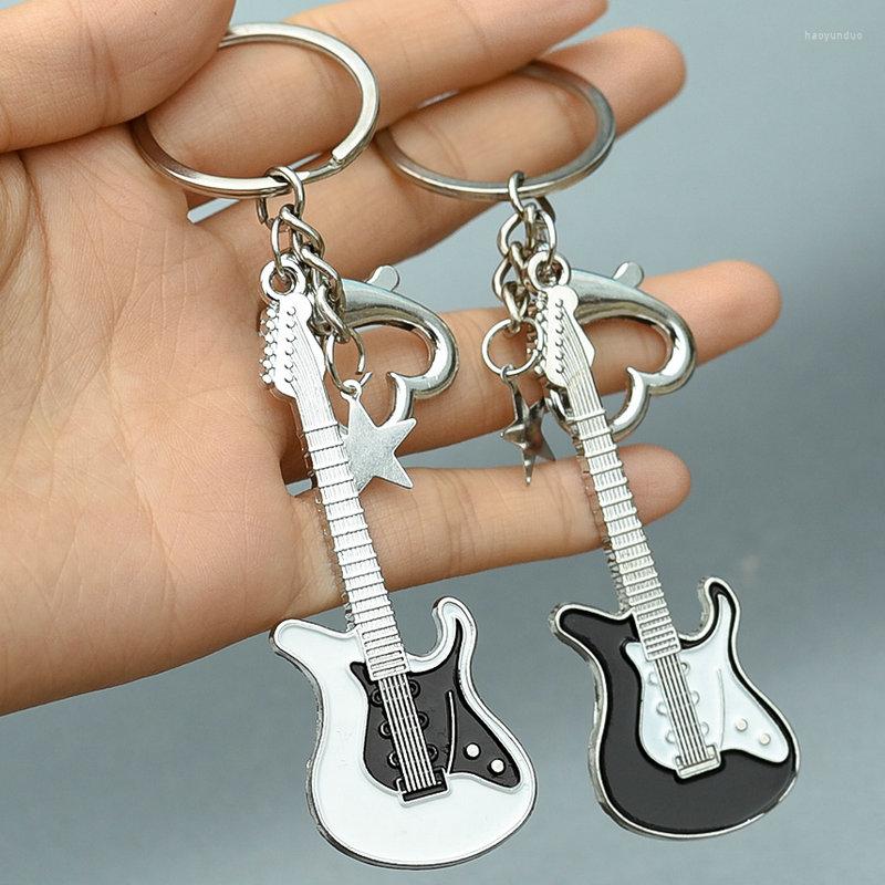 Keychains Y2k Spicy Girl Guitar Pendant Couple Key Chain Keychain Charms For Keys Bag Car Accessories
Keychains Y2k Spicy Girl Guitar Pendant Couple Key Chain Keychain Charms For Keys Bag Car Accessories