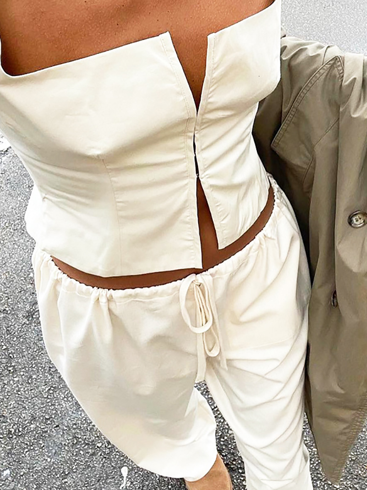 Women's Tanks Camis Fantoye Sexy Low Chest Cardigan Women Top Black Spaghetti Strap Metal Button Female Summer Spicy Girl Streetwear 230419