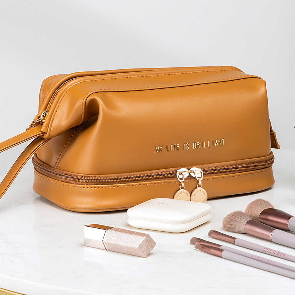Japanese luggage PU leather double layer cloud female cosmetic bag new large capacity portable travel net red wash bag 230420, Single layer mocha brown
Japanese luggage PU leather double layer cloud female cosmetic bag new large capacity portable travel net red wash bag 230420, Single layer mocha brown