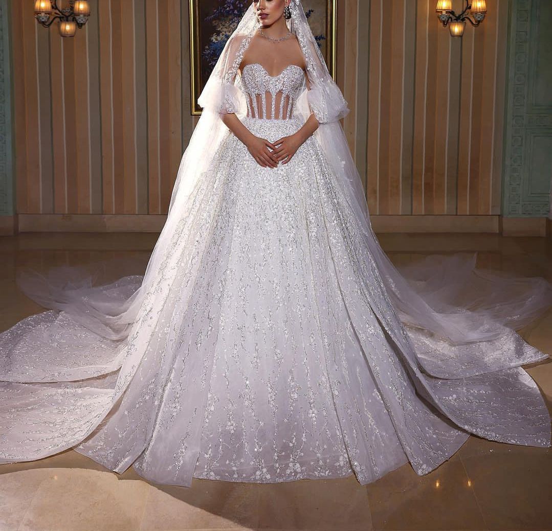 Elegant Ball Gown Wedding Dresses Sleeveless V Neck Sequins Applique Lace Ruffles Bridal Gowns Diamonds Pearls Formal Dress Plus Size Custom Made Vest