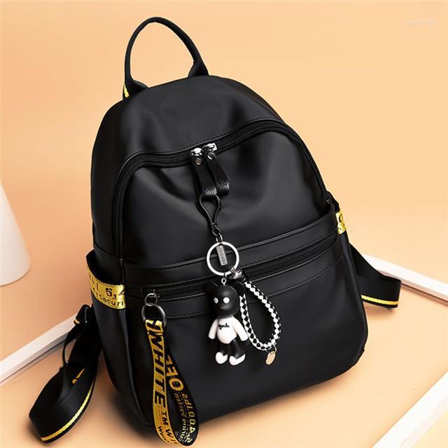 School Bags Shoulder Bag Female Korean Tide Of Fashion Versatile Casual Oxford Canvas Schoolbag Ladies Travel Backpack, Black with pendant
School Bags Shoulder Bag Female Korean Tide Of Fashion Versatile Casual Oxford Canvas Schoolbag Ladies Travel Backpack, Black with pendant