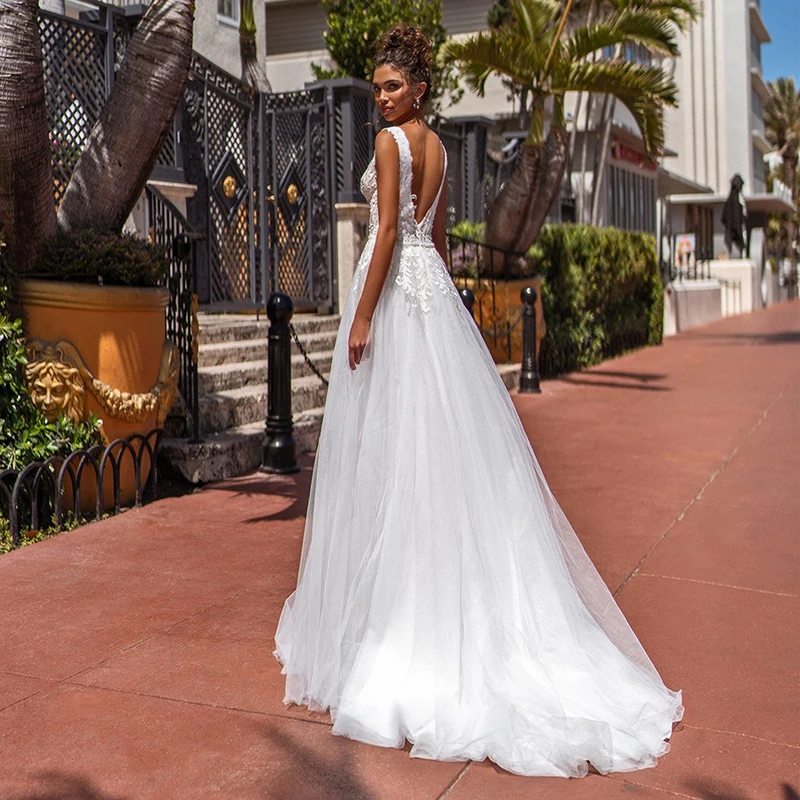 2024 Sexy Backless Boho Wedding Dress V Neck Lace Appliques Long Tulle A Line Bridal Gowns Sleeveless Summer Beach Bride Dresses