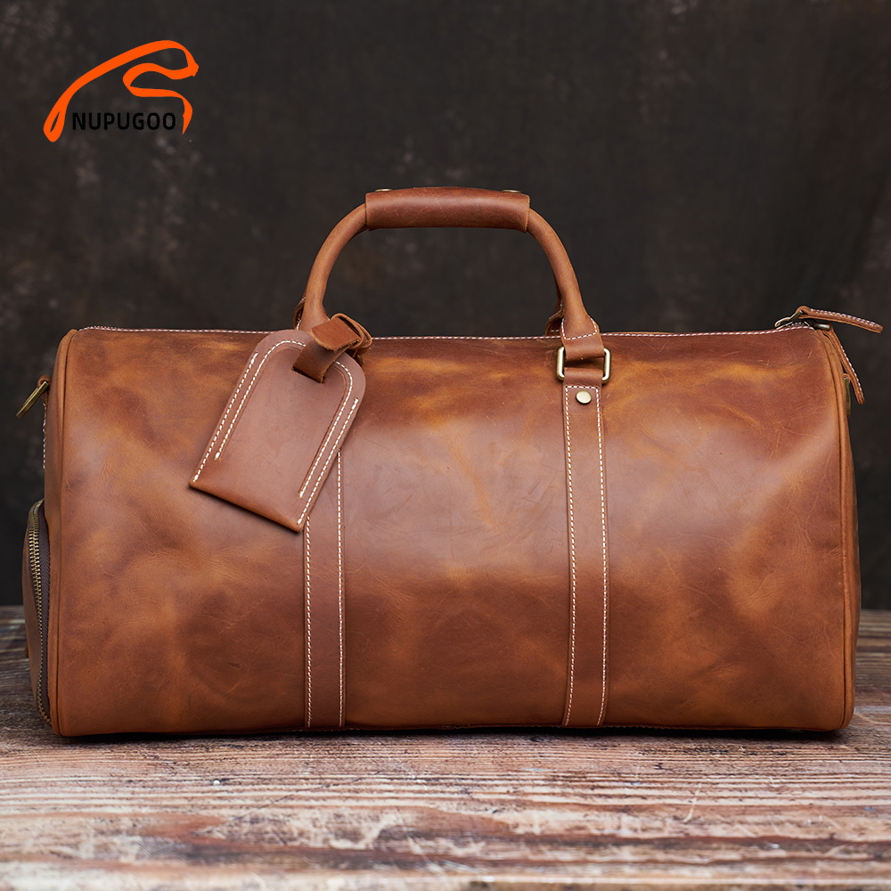 Leather Men's Duffle Bag - Vintage Hand Luggage with Large Capacity for 16-Inch Laptop and Shoulder Strap - Ideal for Traveling and Business Trips, Brown
Leather Men's Duffle Bag - Vintage Hand Luggage with Large Capacity for 16-Inch Laptop and Shoulder Strap - Ideal for Traveling and Business Trips, Brown