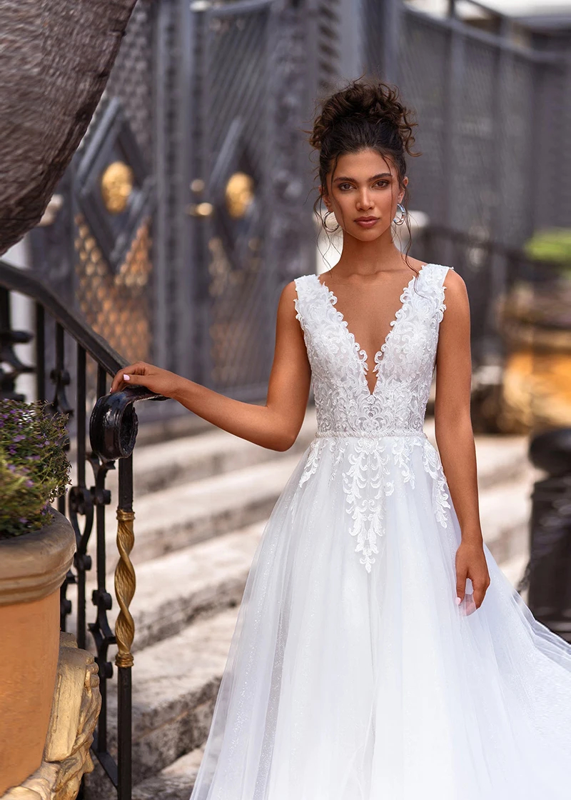 2024 Sexy Backless Boho Wedding Dress V Neck Lace Appliques Long Tulle A Line Bridal Gowns Sleeveless Summer Beach Bride Dresses