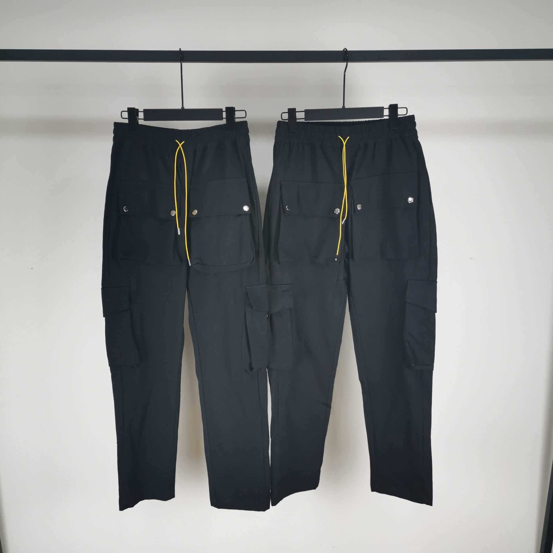 Designer Clothing Casual Pant Rhude Multi Pocket Work Suit Buckle Pants Drawstring Loose Casual Pants Motorcycle Pants Fashion Label For sale, Black
Designer Clothing Casual Pant Rhude Multi Pocket Work Suit Buckle Pants Drawstring Loose Casual Pants Motorcycle Pants Fashion Label For sale, Black