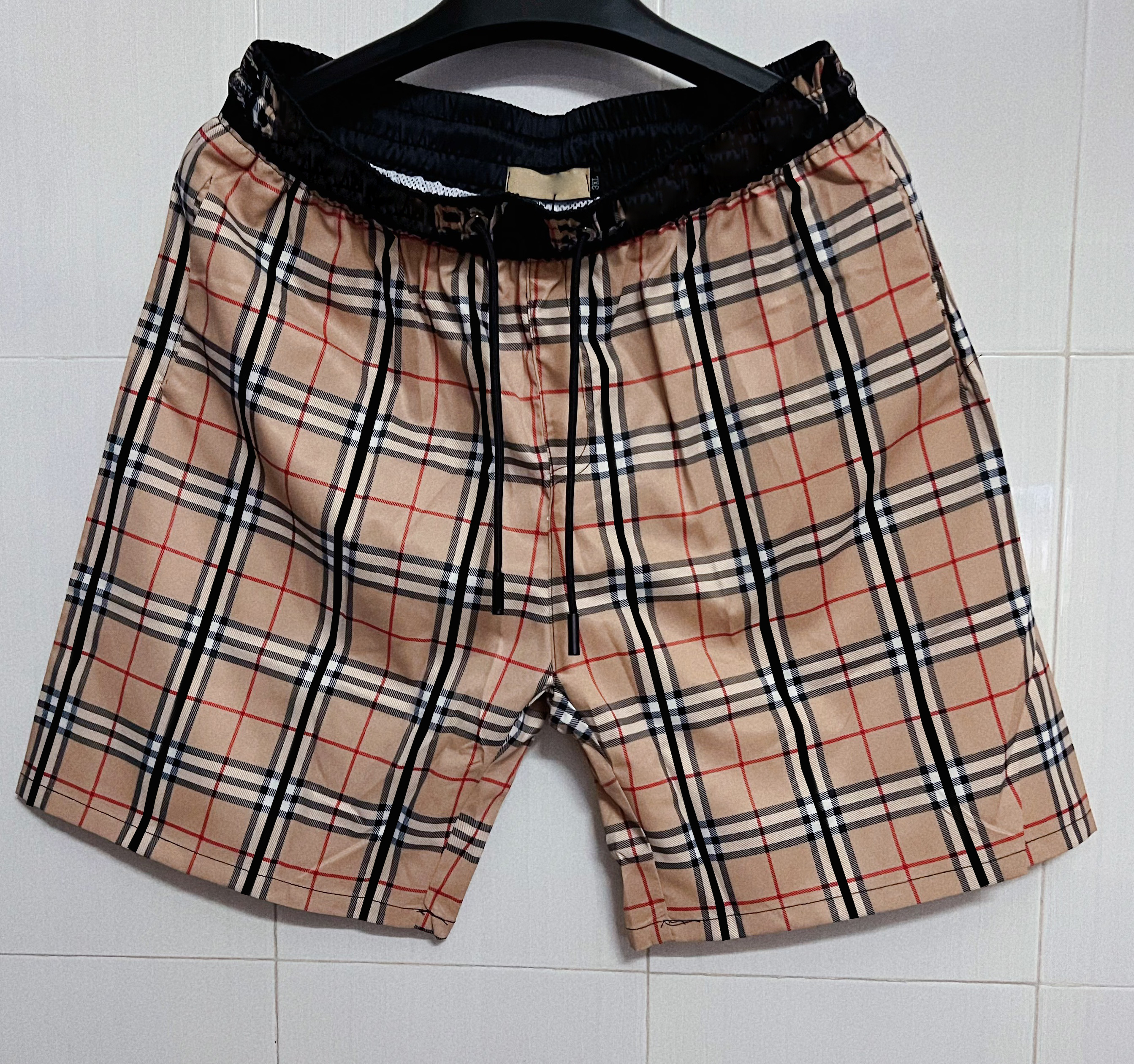 Men's designer summer beach shorts fashion plaid print striped drawstring pants loose men's casual street shorts Asian size M-3XL
Men's designer summer beach shorts fashion plaid print striped drawstring pants loose men's casual street shorts Asian size M-3XL