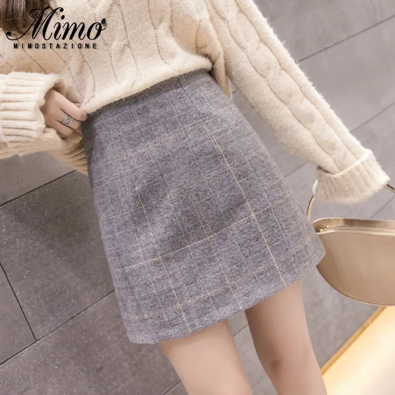 Skirts Spring autumn and winter skirt women Korean version of high waist slim fashion plaid wool Joker Slim A-step skirt 231121