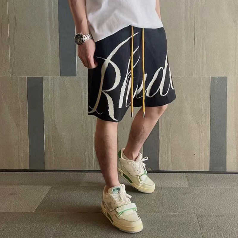 Designer Clothing Rhude Track Niche Trendy Basketball Shorts American Loose Knit Summer Breathable Casual Capris Men Couples Joggers Sportswear Beach fitness, Letter knit quarter pants black
Designer Clothing Rhude Track Niche Trendy Basketball Shorts American Loose Knit Summer Breathable Casual Capris Men Couples Joggers Sportswear Beach fitness, Letter knit quarter pants black