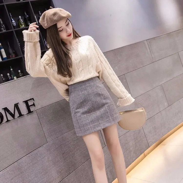 Skirts Spring autumn and winter skirt women Korean version of high waist slim fashion plaid wool Joker Slim A-step skirt 231121