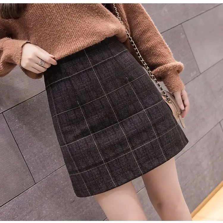 Skirts Spring autumn and winter skirt women Korean version of high waist slim fashion plaid wool Joker Slim A-step skirt 231121