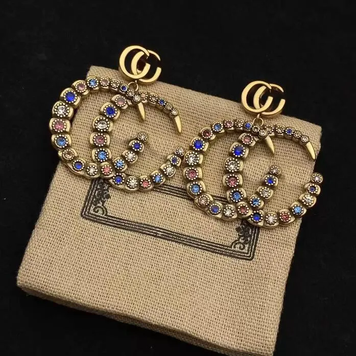 new Dangle fashion brand earring color diamond double G letter brass material personality Earrings women wedding party designer jewelry high quality with box
new Dangle fashion brand earring color diamond double G letter brass material personality Earrings women wedding party designer jewelry high quality with box