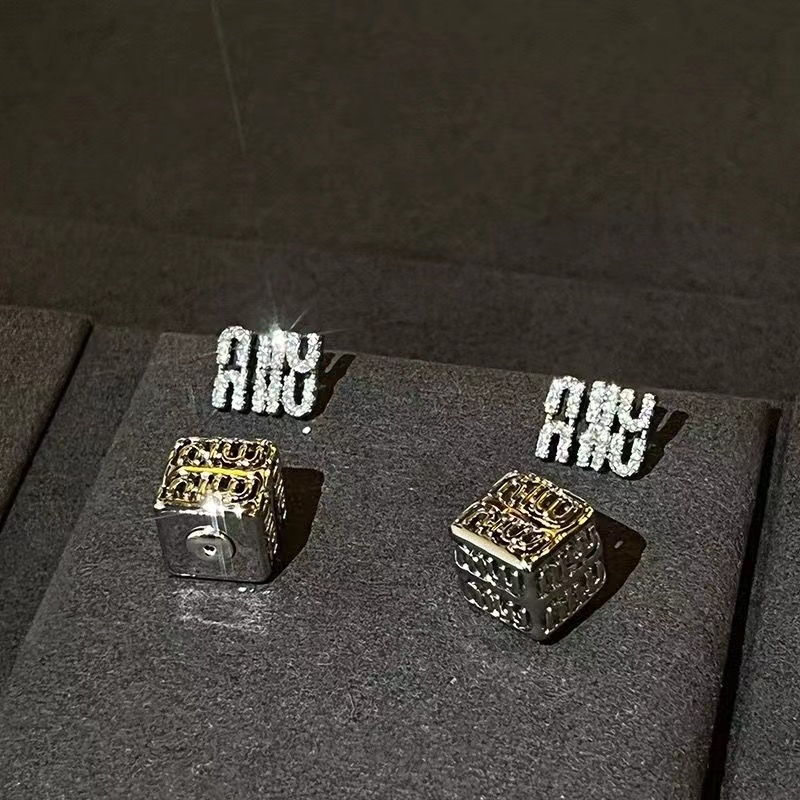 Stereoscopic Miu female earrings glittering diamond letters, niche fashion, two wear and versatile
Stereoscopic Miu female earrings glittering diamond letters, niche fashion, two wear and versatile
