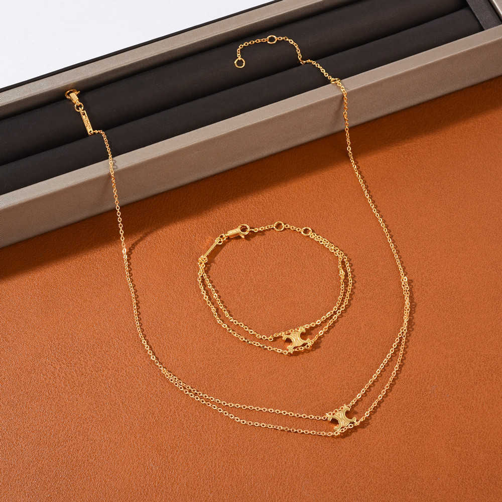 Double-layer Arc de Triomphe Pendant Necklace Bracelet Copper Plated 18k Real Gold Neck Recommended Collar Chain Female
Double-layer Arc de Triomphe Pendant Necklace Bracelet Copper Plated 18k Real Gold Neck Recommended Collar Chain Female