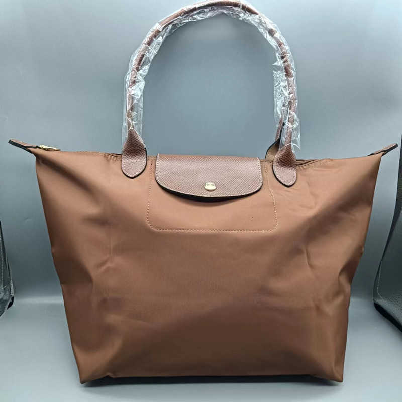 Large Handbag Fabric Clearance Bag Waterproof 70th Anniversary One Oxford Saccoche Shoulder Dumpling Capacity Women French handbag high quality designer, Classic yellow
Large Handbag Fabric Clearance Bag Waterproof 70th Anniversary One Oxford Saccoche Shoulder Dumpling Capacity Women French handbag high quality designer, Classic yellow