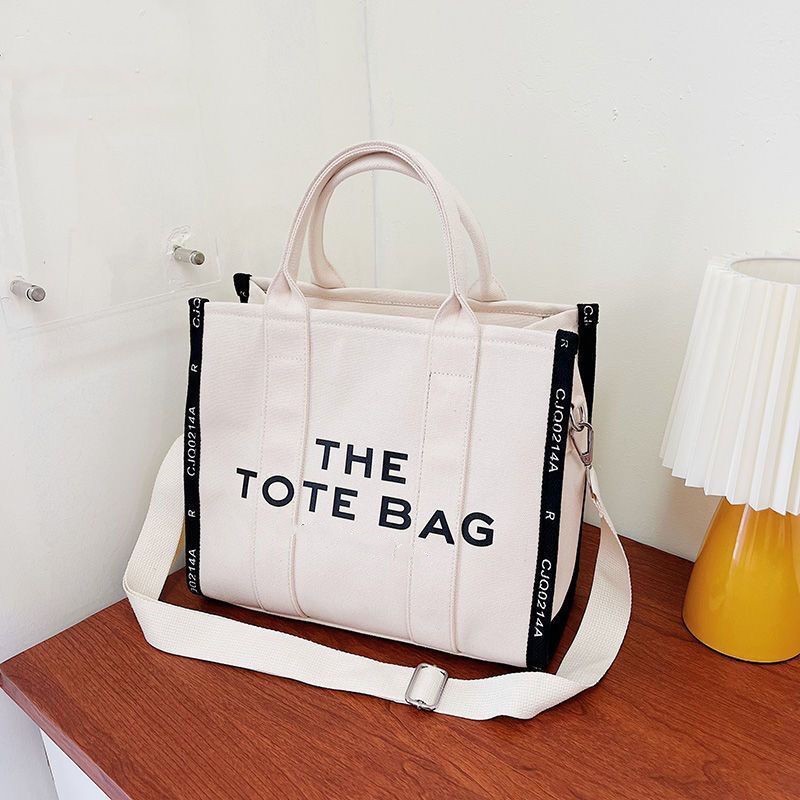 The Tote Bag Lady Famous Designer Canvas Messenger Shopping Bags Cross body Shoulder Bags Handbags Women Totes purse Wallets plain with logo patch on the back MARCJBS, Yellow 
The Tote Bag Lady Famous Designer Canvas Messenger Shopping Bags Cross body Shoulder Bags Handbags Women Totes purse Wallets plain with logo patch on the back MARCJBS, Yellow