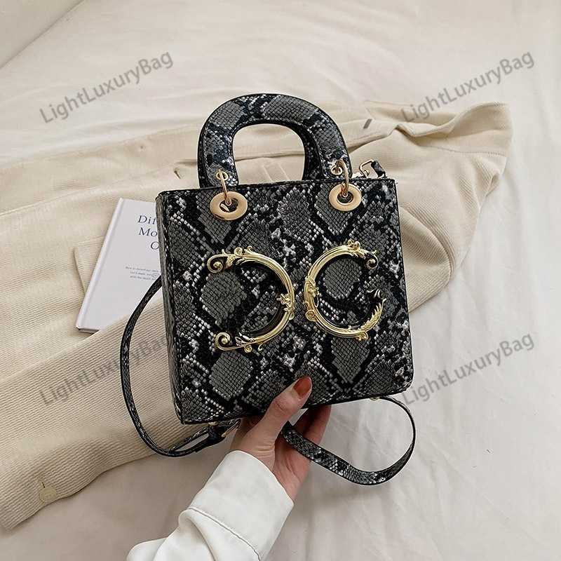 Newly Arrived Designer Snakeskin D Mini Handbags Women's Brand Various Colors Fashion Shoulder Crossbody Bag G Various Colors Handbag Luxury Purse 230427
Newly Arrived Designer Snakeskin D Mini Handbags Women's Brand Various Colors Fashion Shoulder Crossbody Bag G Various Colors Handbag Luxury Purse 230427