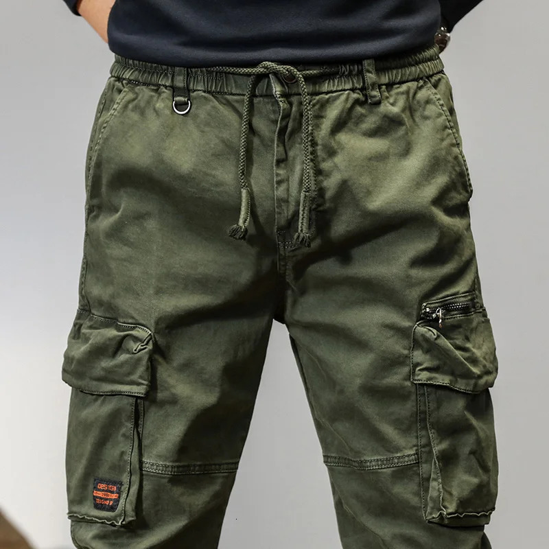 Men's Pants Spring and autumn trendy Cargo pants for men slim leggings ruffian and handsome trousers American multi bag pants outdoor v 231129