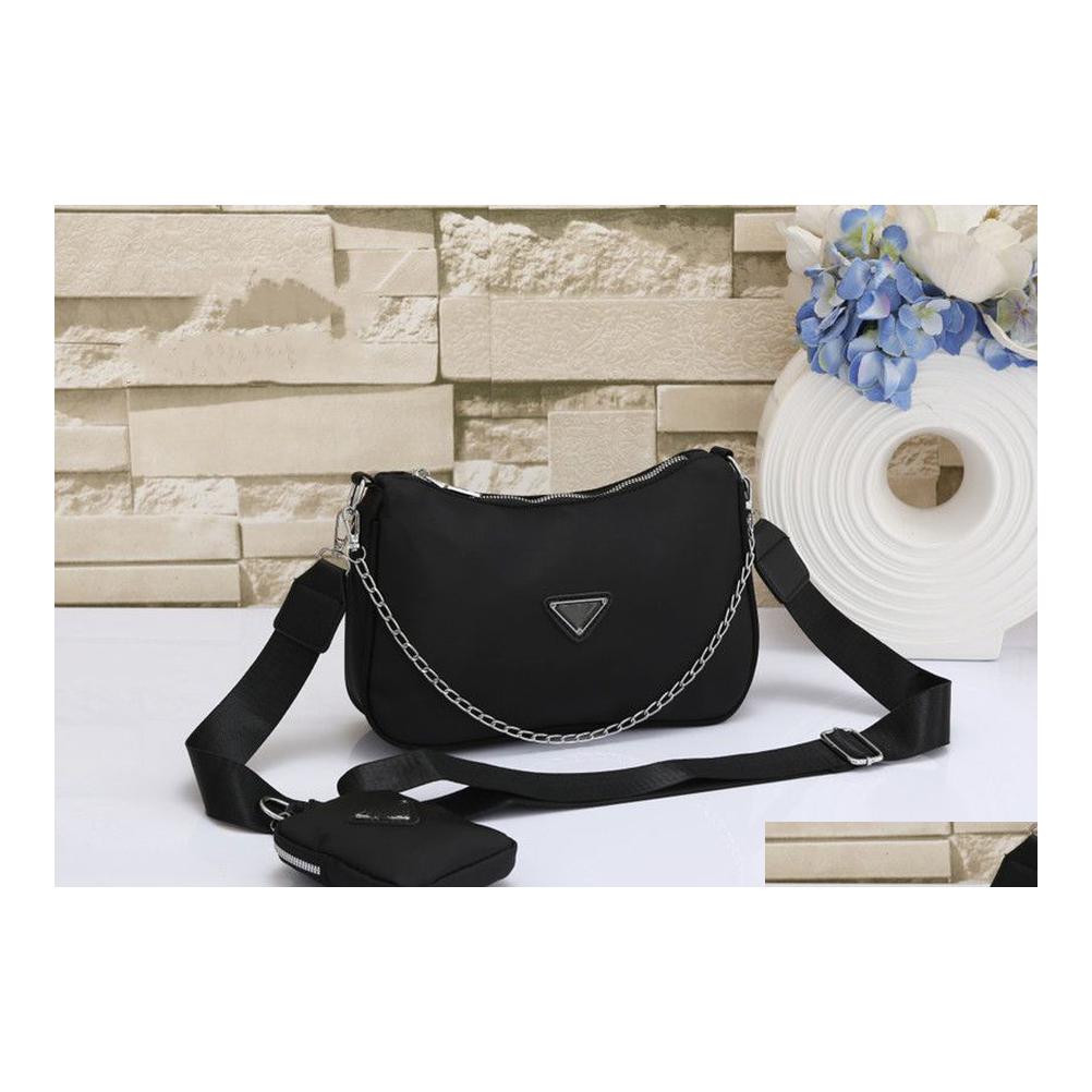 Shoulder Bags High Quality Nylon Man Womens Luxurys Designers Handbags Hobo Purses Lady Handbag Crossbody Shoder Channel Totes Fashi Dhxmu, Add extra express shipping
Shoulder Bags High Quality Nylon Man Womens Luxurys Designers Handbags Hobo Purses Lady Handbag Crossbody Shoder Channel Totes Fashi Dhxmu, Add extra express shipping