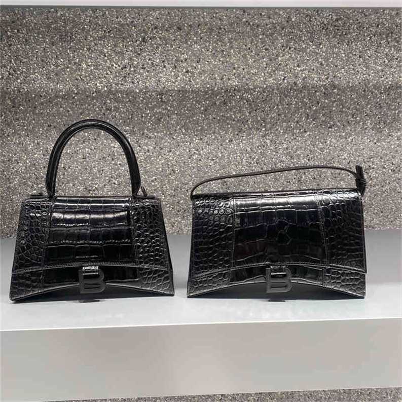 Balenciga Designer Handbags Sling Back Crocodile Embossed Armpit One Shoulder Portable Hourglass Female High Quality Leather Luxury Bag
Balenciga Designer Handbags Sling Back Crocodile Embossed Armpit One Shoulder Portable Hourglass Female High Quality Leather Luxury Bag