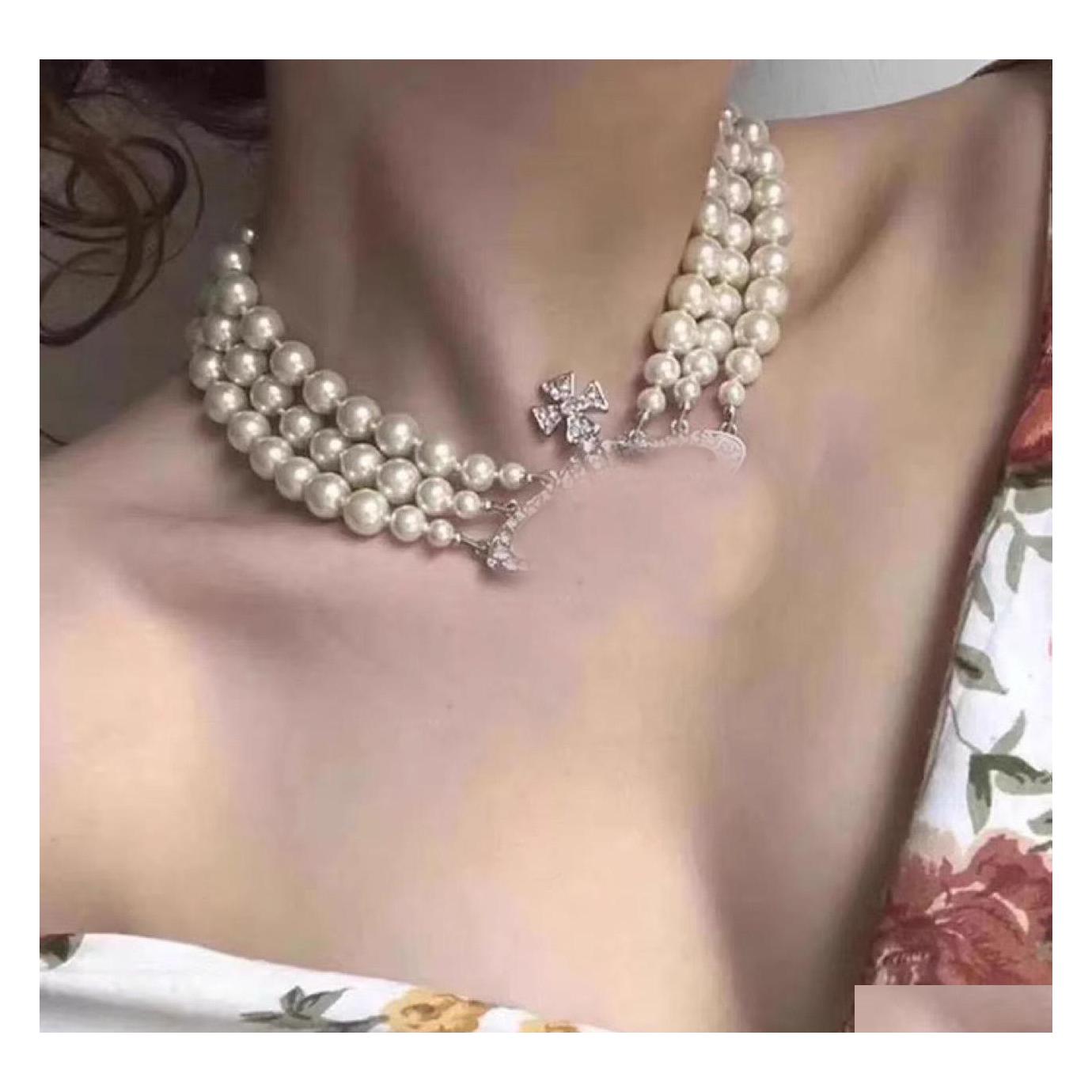 Pendant Necklaces Designer Mtilayer Pearl Rhinestone Orbit Necklace Clavicle Chain Baroque For Women Jewelry Gift Drop Delivery Penda Dhvci
Pendant Necklaces Designer Mtilayer Pearl Rhinestone Orbit Necklace Clavicle Chain Baroque For Women Jewelry Gift Drop Delivery Penda Dhvci