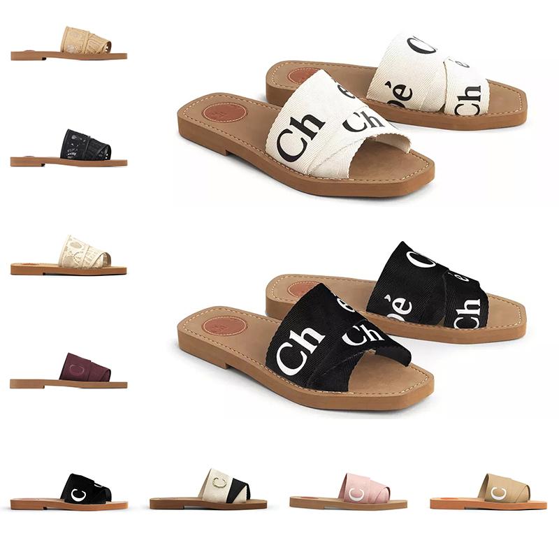 Designer canvas slippers cross woven roman summer slippers leather sandals fashion beach sandals summer wide flat lady sandals luxurys mule slides
Designer canvas slippers cross woven roman summer slippers leather sandals fashion beach sandals summer wide flat lady sandals luxurys mule slides