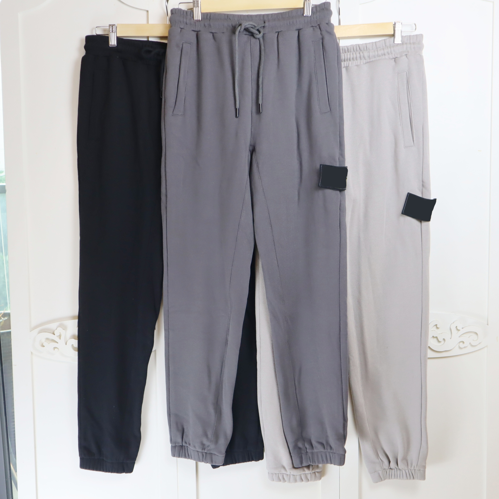 Mens jogger pants brand designer Stone Three colors Simple sweatpants Island Spring autumn joggers Streetwear Trousers Men Pant 8336
Mens jogger pants brand designer Stone Three colors Simple sweatpants Island Spring autumn joggers Streetwear Trousers Men Pant 8336