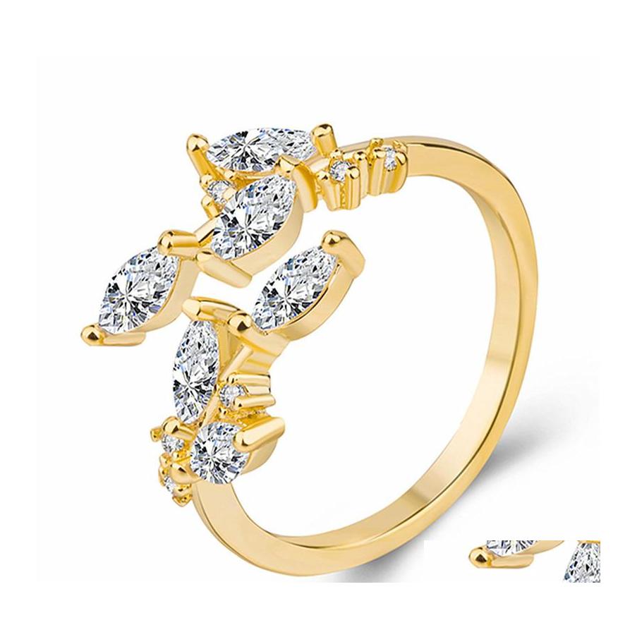 With Side Stones Korean Zircon Leaves Adjustable Rings Gold Rose Color Open Finger Ring Wedding Wholesale For Women Girls Jewelry Pa Otxvd
With Side Stones Korean Zircon Leaves Adjustable Rings Gold Rose Color Open Finger Ring Wedding Wholesale For Women Girls Jewelry Pa Otxvd
