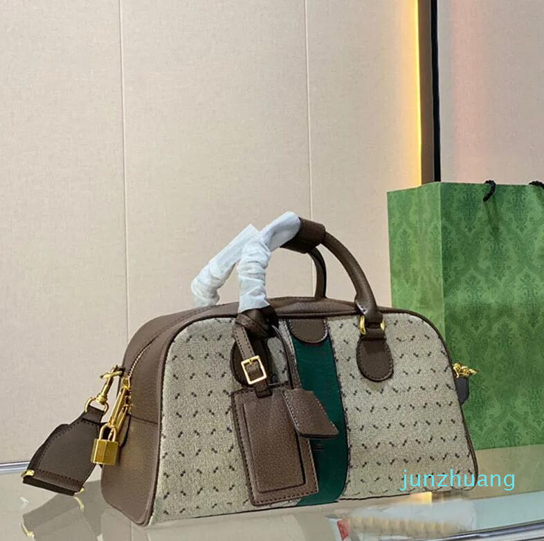 Brown Bowling Bags Women Canvas Cross Body Bag Designer Handbags Presbyopic Letter 22 Zipper Lining Pouch Woven Removable Strap Genuine Leather Handle Totes
Brown Bowling Bags Women Canvas Cross Body Bag Designer Handbags Presbyopic Letter 22 Zipper Lining Pouch Woven Removable Strap Genuine Leather Handle Totes