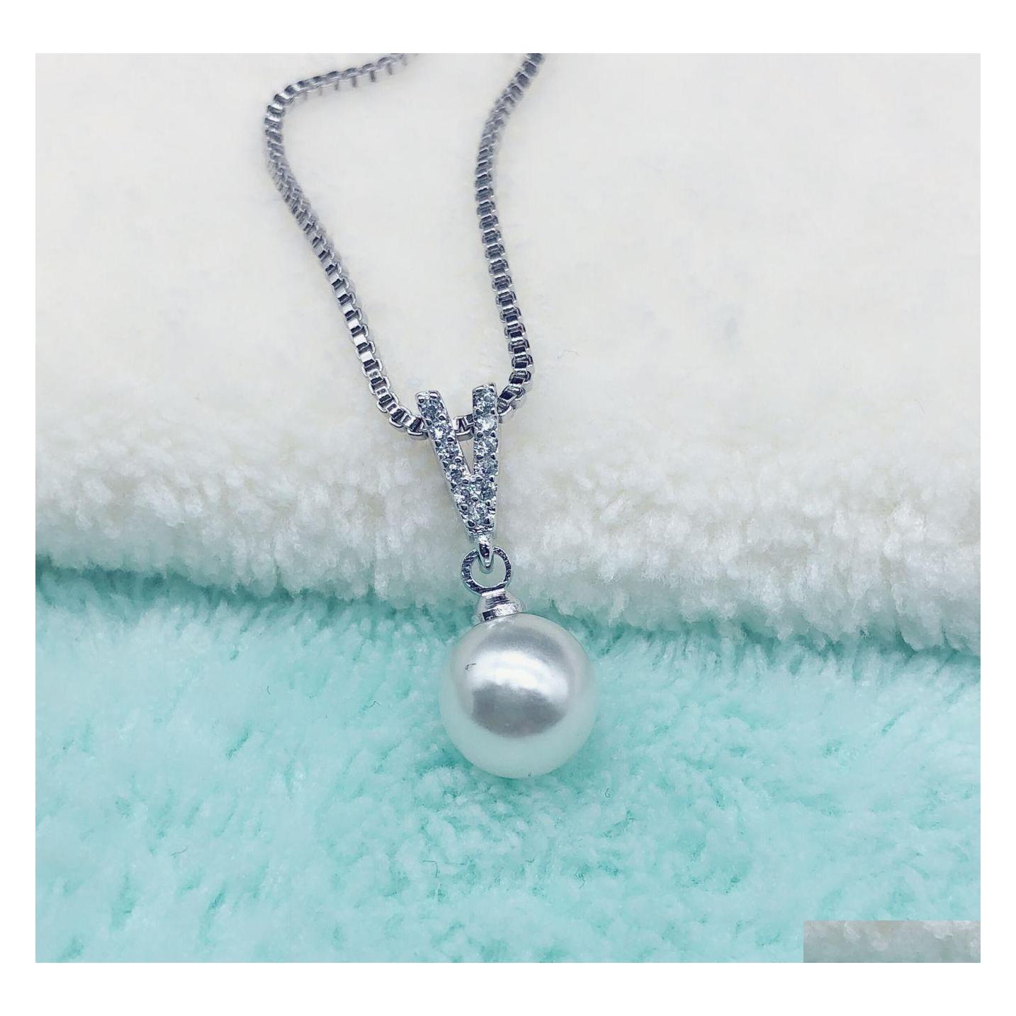 Pendant Necklaces Sier Necklace Imitation 925 Sterling Foe Women Wedding Jewelry Accessories Simated Pearls Drop Delivery Pendants Dhckp
Pendant Necklaces Sier Necklace Imitation 925 Sterling Foe Women Wedding Jewelry Accessories Simated Pearls Drop Delivery Pendants Dhckp