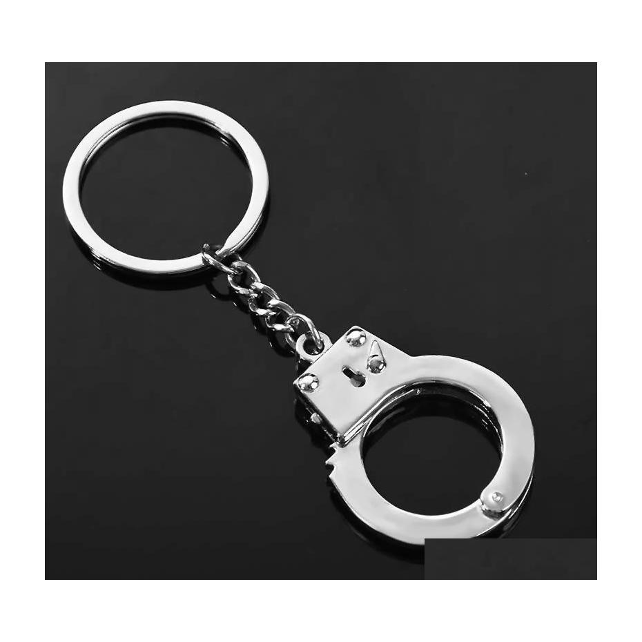 Key Rings Simation Handcuffs Metal Keychain Car Bottle Opener Men And Women 79 E3 Drop Delivery Jewelry Dhiqs
Key Rings Simation Handcuffs Metal Keychain Car Bottle Opener Men And Women 79 E3 Drop Delivery Jewelry Dhiqs