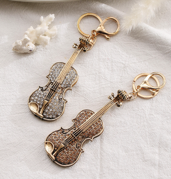 Quality Rhinestone Guitar Shape Small Gift Package Pendant Alloy Tarnish Keychain Ornaments Little Creative Gifts
Quality Rhinestone Guitar Shape Small Gift Package Pendant Alloy Tarnish Keychain Ornaments Little Creative Gifts
