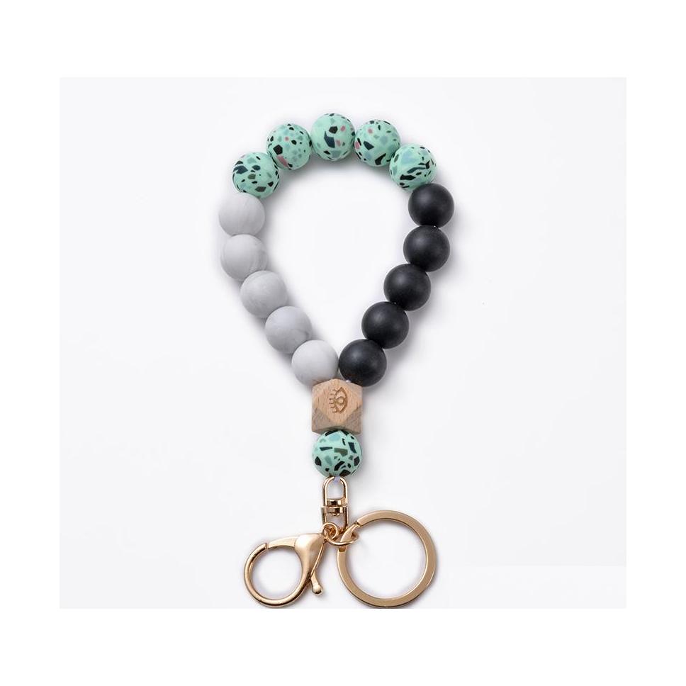 Key Rings Sile Keychain Wooden Beads Chains Leopard Printing Circle Keyring Mticolor Women Jewelry C3 Drop Delivery Dhetj
Key Rings Sile Keychain Wooden Beads Chains Leopard Printing Circle Keyring Mticolor Women Jewelry C3 Drop Delivery Dhetj