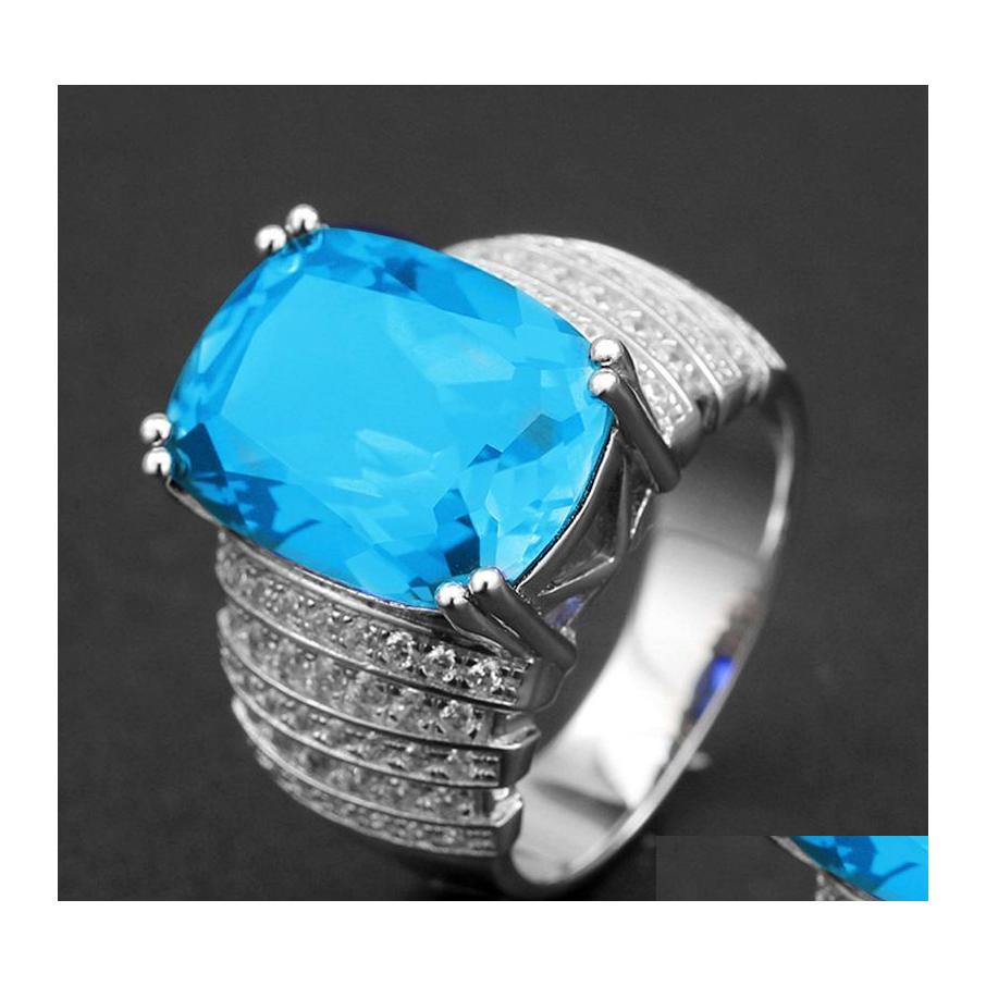 With Side Stones Mens Rings Gemstones Gift Accessories Surround Set Imitation Topaz Aquamarine Platinum Plated Green Tourmaline Tren Dhwiu
With Side Stones Mens Rings Gemstones Gift Accessories Surround Set Imitation Topaz Aquamarine Platinum Plated Green Tourmaline Tren Dhwiu