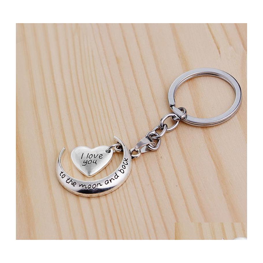 Key Rings Letter Ring Heart Keychain I Love You To The Moon And Back Bag Hangs Fashion Jewelry 326C3 Drop Delivery Dhgkz
Key Rings Letter Ring Heart Keychain I Love You To The Moon And Back Bag Hangs Fashion Jewelry 326C3 Drop Delivery Dhgkz