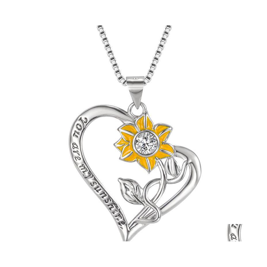 Pendant Necklaces Heart Sunflower Necklace Romantic Love Sun Flower Charm Chain Jewelry For Lady Accessories Luckyhat Drop Delivery P Dhxvi
Pendant Necklaces Heart Sunflower Necklace Romantic Love Sun Flower Charm Chain Jewelry For Lady Accessories Luckyhat Drop Delivery P Dhxvi
