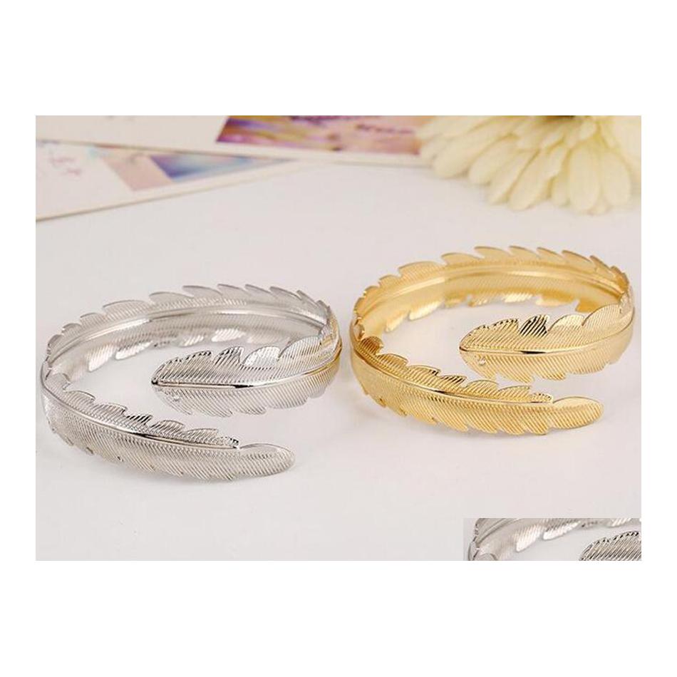 Charm Bracelets Fashion Bangle Gold Metal 18K Plated Leaf Bracelet Open Cuff Drop Delivery Jewelry Dhqjf
Charm Bracelets Fashion Bangle Gold Metal 18K Plated Leaf Bracelet Open Cuff Drop Delivery Jewelry Dhqjf