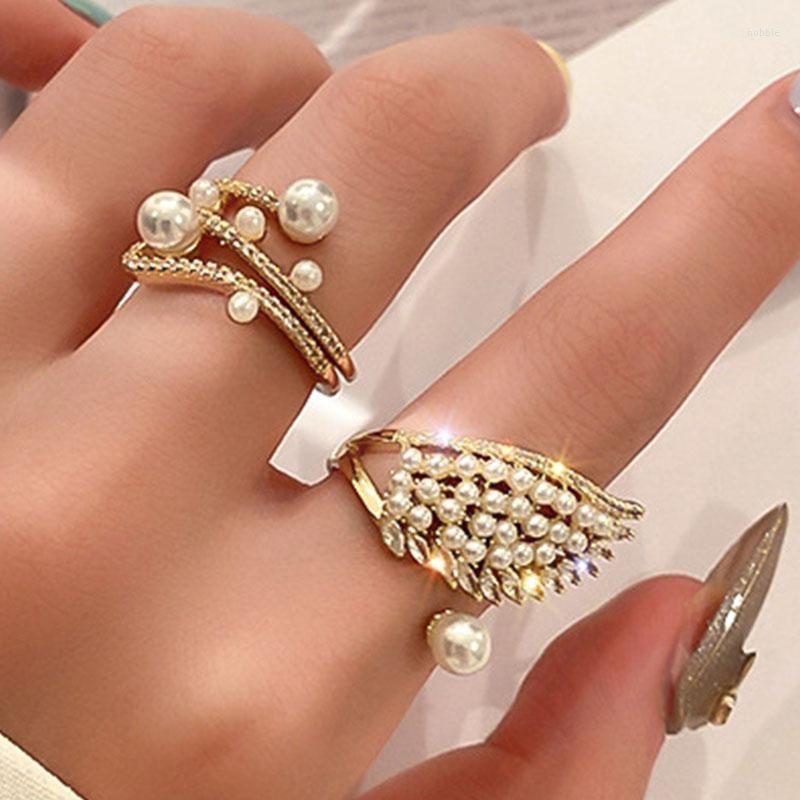 Wedding Rings Uilz Luxury Pearl Zircon Opening Adjustable Ring For Women South Korea's Wing Unusual Jewelry Exquisite Gifts 2023
Wedding Rings Uilz Luxury Pearl Zircon Opening Adjustable Ring For Women South Korea's Wing Unusual Jewelry Exquisite Gifts 2023