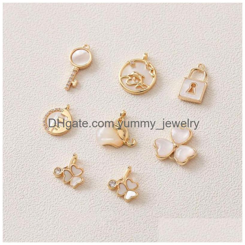 Pendant Necklaces 1Pcs Designer Charms Shell Key Lock Superior Quality Jewelry Making Necklace Bracelet Diy 14K Gold Plated Drop Del Dhu4A
Pendant Necklaces 1Pcs Designer Charms Shell Key Lock Superior Quality Jewelry Making Necklace Bracelet Diy 14K Gold Plated Drop Del Dhu4A