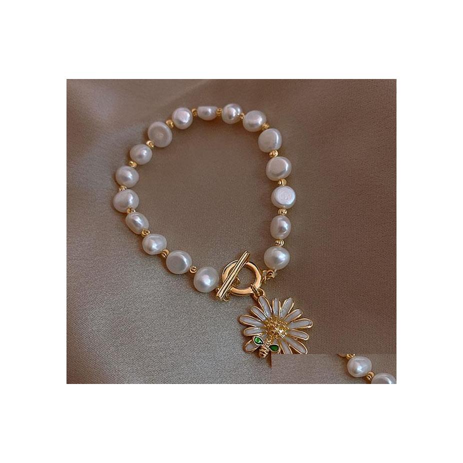 Charm Bracelets Fashion Jewelry Vintage Daisy Pendant Sunflower Pearl Beads Bracelet Drop Delivery Dhdpm
Charm Bracelets Fashion Jewelry Vintage Daisy Pendant Sunflower Pearl Beads Bracelet Drop Delivery Dhdpm