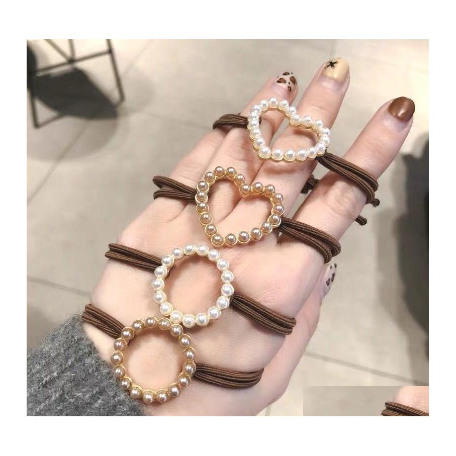 Hair Rubber Bands Love Clover Rope Ring Simple Retro Pearl Headdress Drop Delivery Jewelry Hairjewelry Dhogy
Hair Rubber Bands Love Clover Rope Ring Simple Retro Pearl Headdress Drop Delivery Jewelry Hairjewelry Dhogy