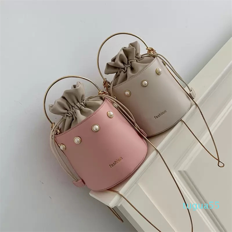 Totes HBP fashion western style all-match pearl bucket bag ins mini portable, Creamy white
Totes HBP fashion western style all-match pearl bucket bag ins mini portable, Creamy white