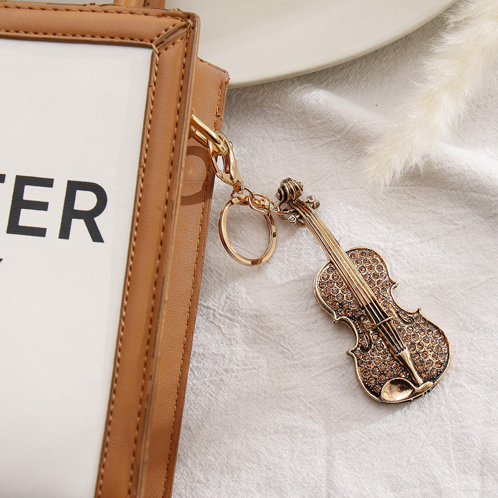 American Rhinestone Guitar Shape Small Gift Package Pendant Alloy Tarnish Keychain Ornaments Little Creative Gifts
American Rhinestone Guitar Shape Small Gift Package Pendant Alloy Tarnish Keychain Ornaments Little Creative Gifts