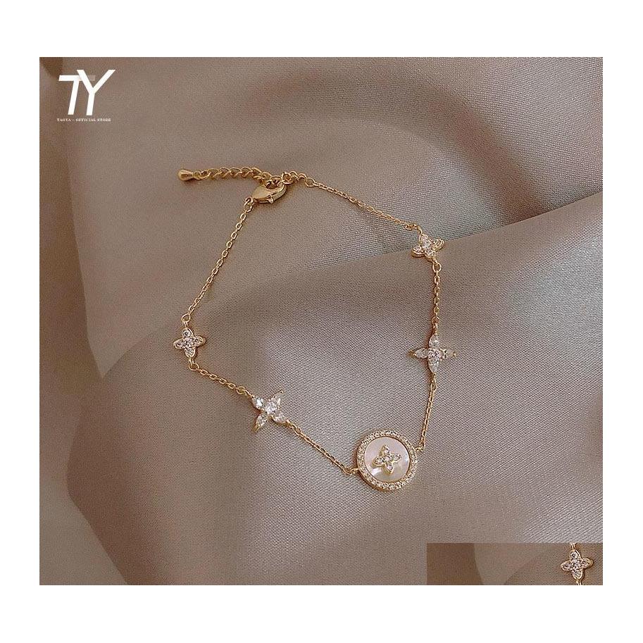 Charm Bracelets Bracelet Mode Micro Zirkoon Korean Womens Jewelry Classic Alloy Plum Blossom Cross Shape Drop Delivery Ottdr
Charm Bracelets Bracelet Mode Micro Zirkoon Korean Womens Jewelry Classic Alloy Plum Blossom Cross Shape Drop Delivery Ottdr