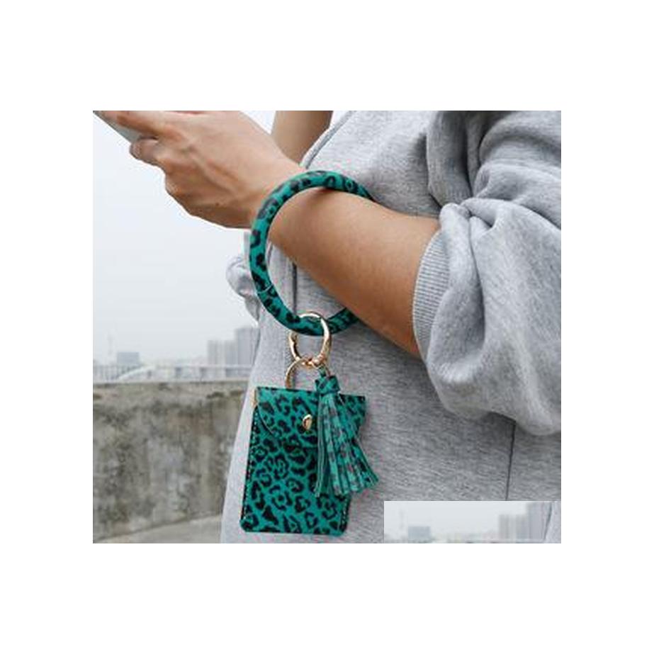 Key Rings Women Girls Leopard Pu Leather Bracelet Ring Bangle Keyring Tassel Circle Keychain Wristlet Keyrings With Wallet Card Drop Dhdl8
Key Rings Women Girls Leopard Pu Leather Bracelet Ring Bangle Keyring Tassel Circle Keychain Wristlet Keyrings With Wallet Card Drop Dhdl8