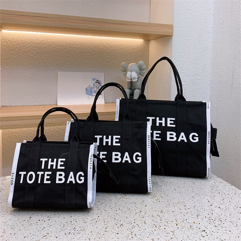 Totes Marc Tote Bag Women Casual Canvas Designer bags Single Shoulder Diagonal Trend Letter Leisure Fashion High Capacity Handbag
Totes Marc Tote Bag Women Casual Canvas Designer bags Single Shoulder Diagonal Trend Letter Leisure Fashion High Capacity Handbag