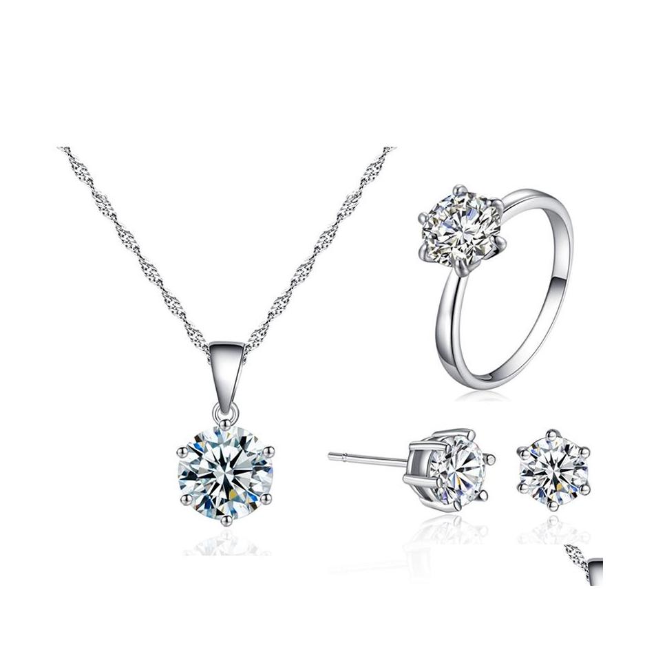 Other Jewelry Sets Fashion Sier Bridal For Women Accessory Cubic Zircon Crystal Necklace Rings Stud Earrings Set Gift Drop Delivery Otvq3
Other Jewelry Sets Fashion Sier Bridal For Women Accessory Cubic Zircon Crystal Necklace Rings Stud Earrings Set Gift Drop Delivery Otvq3