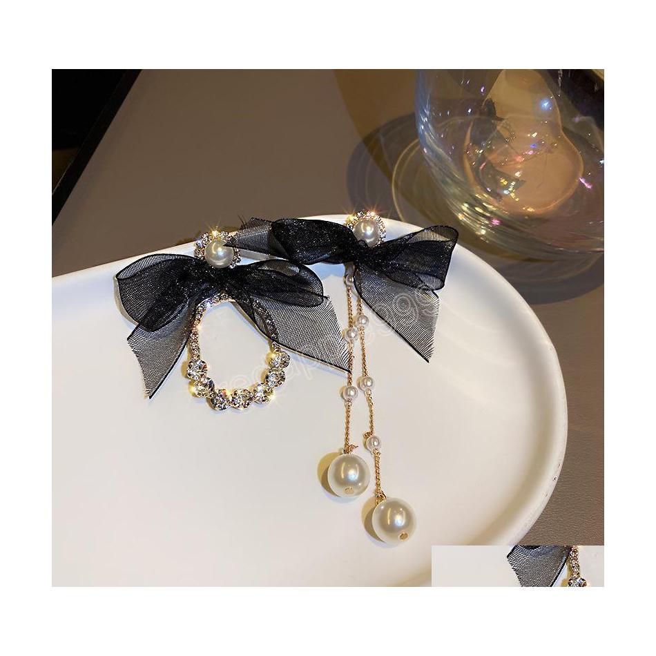 Dangle Chandelier Trendy Bowknot Lace Asymmetric Pearl Long Tassel Earrings For Women Fashion Crystal Earring Jewelry Drop Delivery Dh3Pi
Dangle Chandelier Trendy Bowknot Lace Asymmetric Pearl Long Tassel Earrings For Women Fashion Crystal Earring Jewelry Drop Delivery Dh3Pi