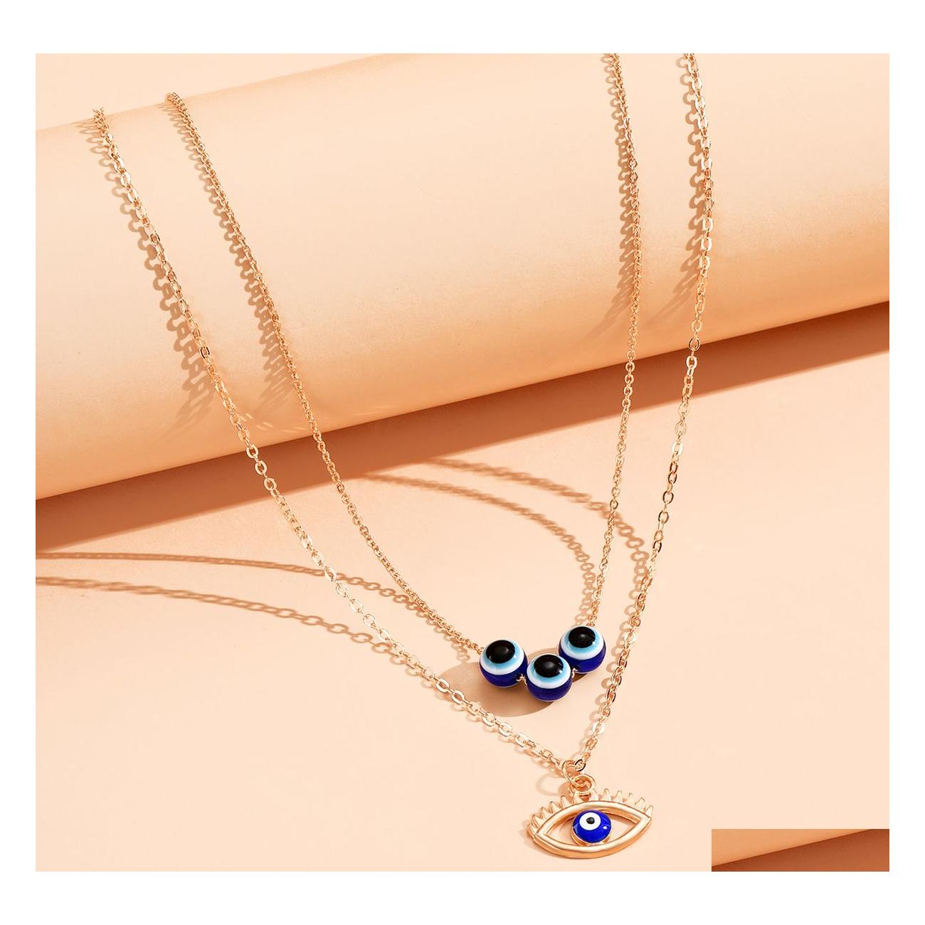 Pendant Necklaces Fashion Jewelry Evil Eye Necklace For Women Double Layer Blue Eyes Choker Drop Delivery Pendants Dhe3K
Pendant Necklaces Fashion Jewelry Evil Eye Necklace For Women Double Layer Blue Eyes Choker Drop Delivery Pendants Dhe3K